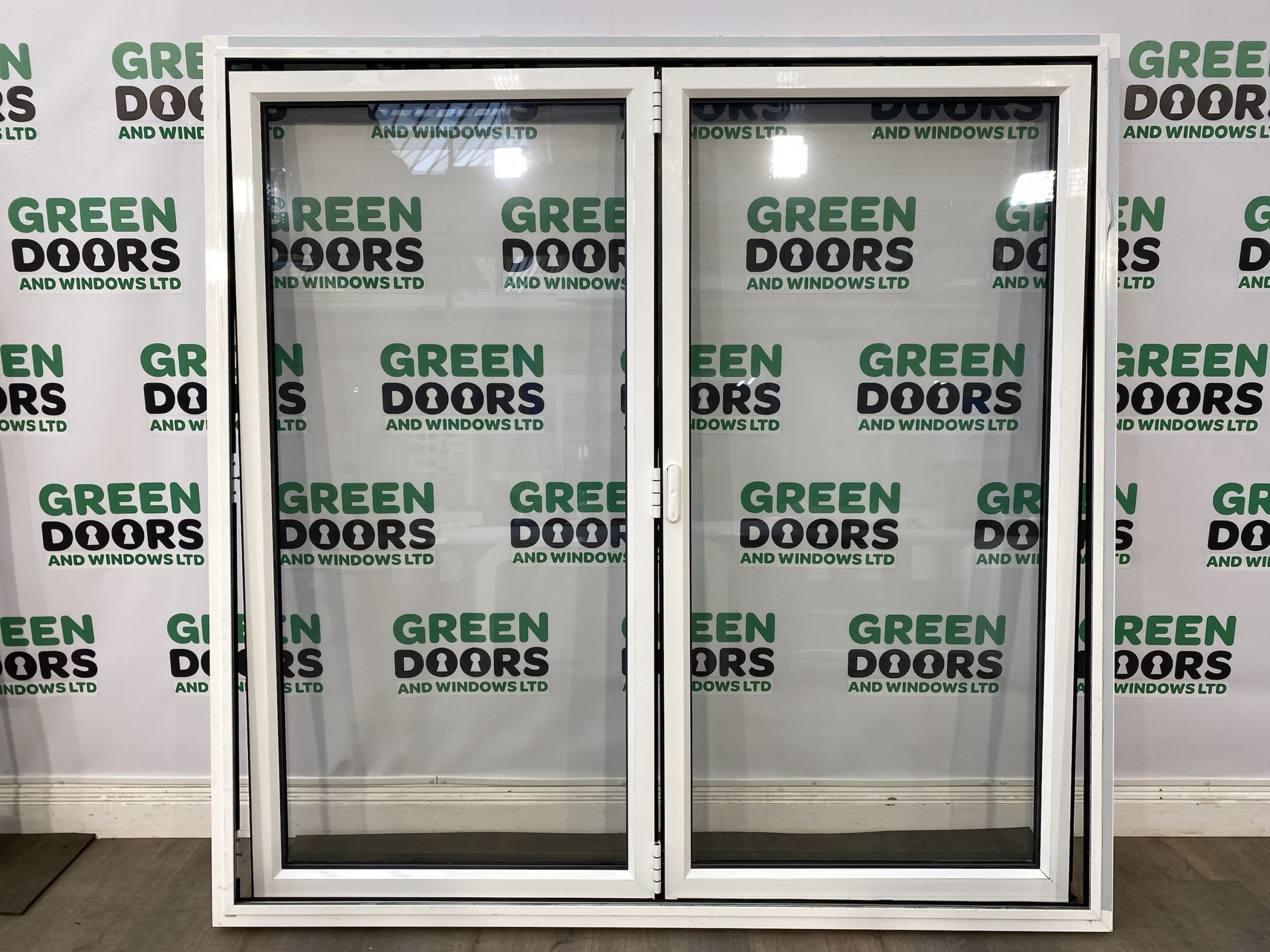 ALUK Aluminium White Bifolding doors Green doors